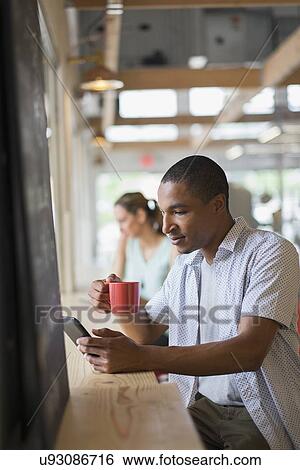 Stock Photograph - People in coffee shop. Fotosearch