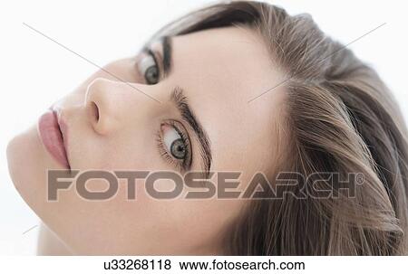 Stock Photo - Portrait of attractive young woman . Fotosearch