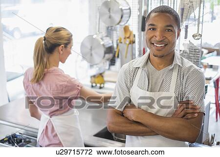 Portrait of bakery owner View Large Photo Image Stock Image - Portrait of bakery owner. Fotosearch