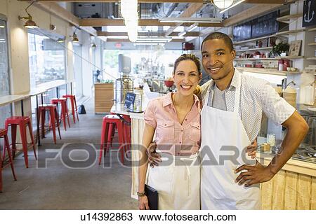 Portrait of bakery owners View Large Photo Image Stock Image - Portrait of bakery owners. Fotosearch