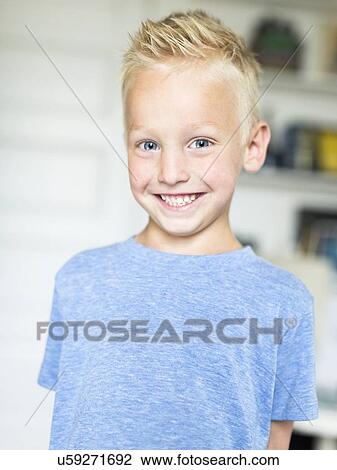 Stock Image - Portrait of blue eyed boy (4-5). Fotosearch