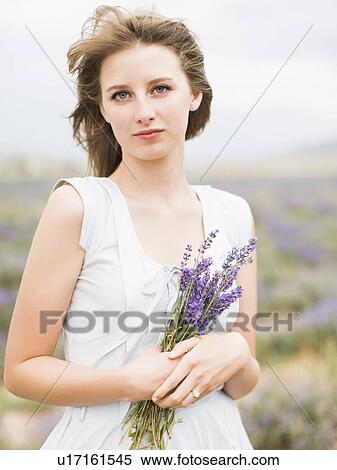 Portrait of bride with bunch of lavender View Large Photo Image Stock Photography - Portrait of bride with bunch of lavender. Fotosearch