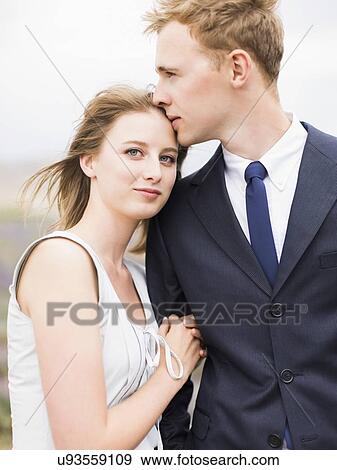 Stock Photo - Portrait of newlywed couple . Fotosearch