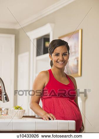 Portrait of pregnant woman smiling View Large Photo Image Stock Photograph - Portrait of pregnant woman smiling. Fotosearch