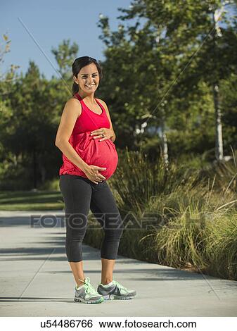 Portrait of pregnant woman smiling View Large Photo Image Stock Photograph - Portrait of pregnant woman smiling. Fotosearch