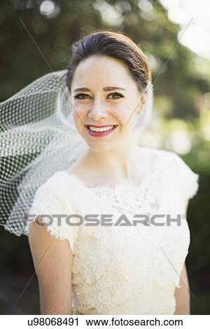 Portrait of smiling bride View Large Photo Image Stock Image - Portrait of smiling bride. Fotosearch