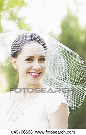 Stock Photo - Portrait of smiling bride. Fotosearch