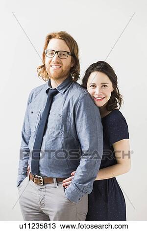 Stock Image - Portrait of smiling couple. Fotosearch