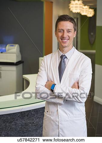 Portrait of smiling dentist View Large Photo Image Stock Image - Portrait of smiling dentist . Fotosearch