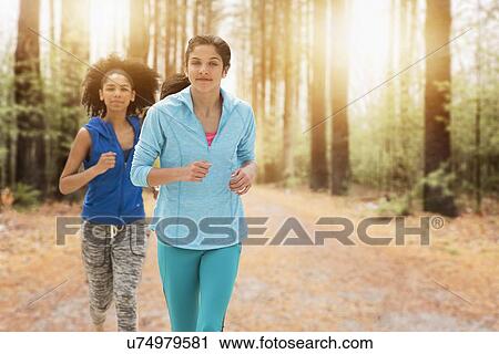 Portrait of teenage girls (14-15, 16-17) running View Large Photo Image Stock Image - Portrait of teenage girls (14-15, 16-17) running. Fotosearch