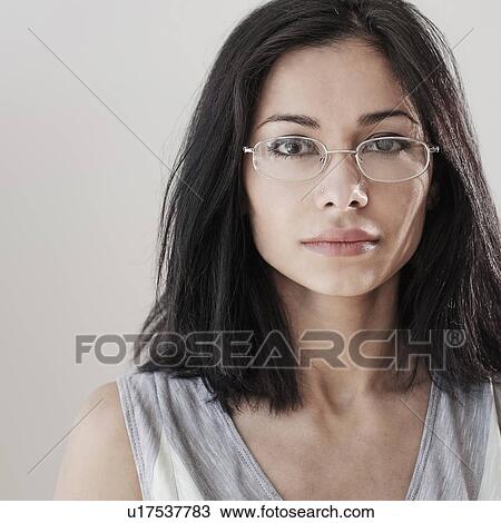 Stock Image - Portrait of young woman. Fotosearch