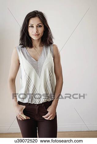 Stock Image - Portrait of young woman. Fotosearch