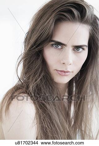 Portrait of young woman with blue eyes View Large Photo Image Picture - Portrait of young woman with blue eyes. Fotosearch
