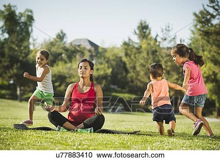 Pregnant mother and children (2-3, 6-7, 8-9) in park View Large Photo Image Stock Image - Pregnant mother and children (2-3, 6-7, 8-9) in park. Fotosearch