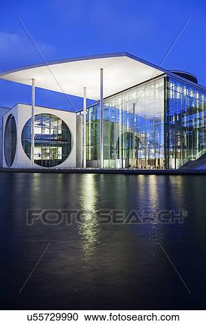 Riverfront parliament office building illuminated at dusk View Large Photo Image Stock Image - Riverfront parliament office building illuminated at dusk. Fotosearch