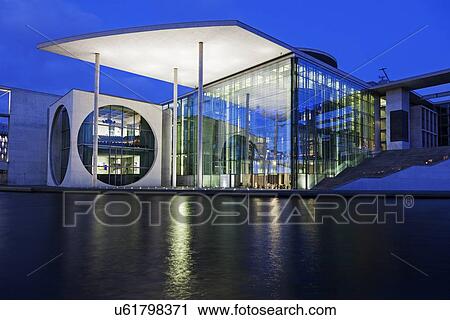 Riverfront parliament office building illuminated at dusk View Large Photo Image Stock Image - Riverfront parliament office building illuminated at dusk. Fotosearch