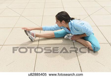Teenage girl (14-15) stretching View Large Photo Image Stock Photography - Teenage girl (14-15) stretching. Fotosearch
