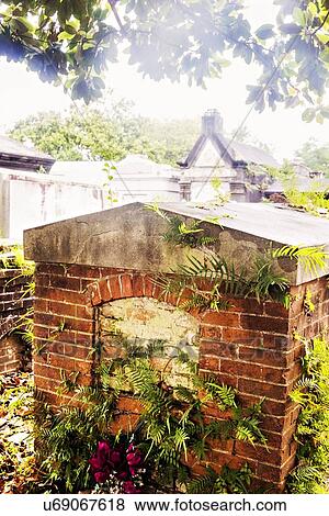 Stock Photo - Tomb in old cemetery. Fotosearch