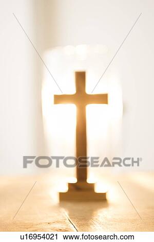 Stock Image - View of backlit cross. Fotosearch