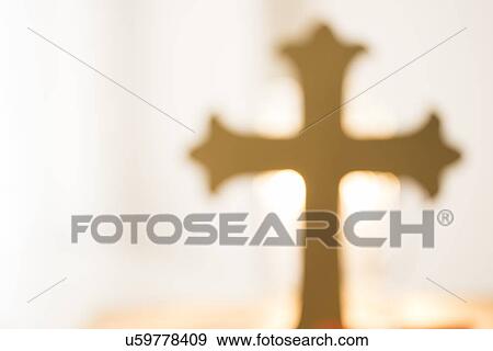 Stock Photo - View of backlit cross. Fotosearch