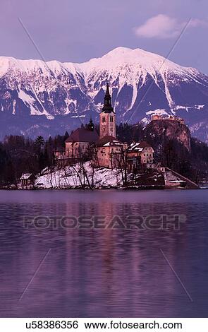 View of Church of the Assumption with lake and mountain View Large Photo Image Stock Photograph - View of Church of the Assumption with lake and mountain. Fotosearch