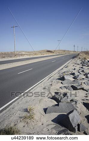 View of empty highway in desert View Large Photo Image Stock Photo - View of empty highway in desert. Fotosearch