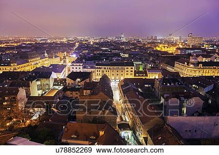 Stock Photo - View of illuminated old town. Fotosearch