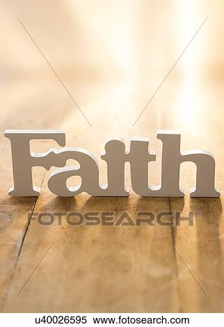 Stock Photography - View of single word 'faith'. Fotosearch