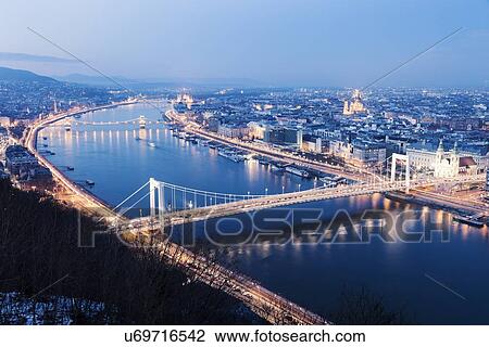 Waterfront cityscape with illuminated Elisabeth Bridge View Large Photo Image Stock Image - Waterfront cityscape with illuminated Elisabeth Bridge. Fotosearch