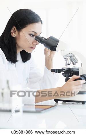 Woman doing laboratory research View Large Photo Image Stock Photograph - Woman doing laboratory research. Fotosearch