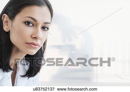 Stock Photo - Woman in laboratory. Fotosearch