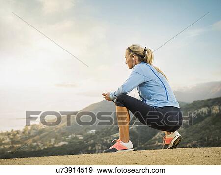 Stock Photo - Woman in mountains. Fotosearch