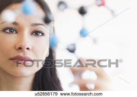 Stock Photo - Woman working in laboratory. Fotosearch