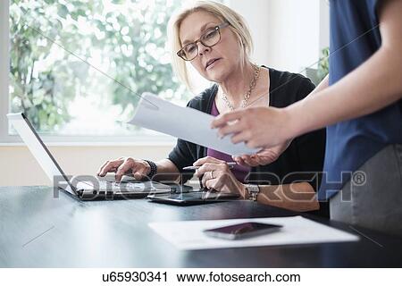 Women working in office View Large Photo Image Stock Image - Women working in office. Fotosearch