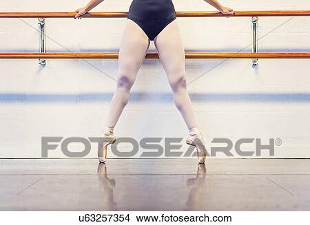 Young woman dancing in dance studio View Large Photo Image Picture - Young woman dancing in dance studio. Fotosearch