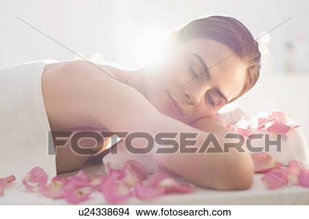 Young woman during beauty treatment View Large Photo Image Picture - Young woman during beauty treatment. Fotosearch