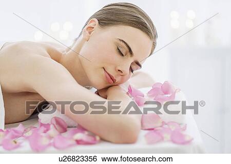 Young woman during beauty treatment View Large Photo Image Stock Photograph - Young woman during beauty treatment. Fotosearch