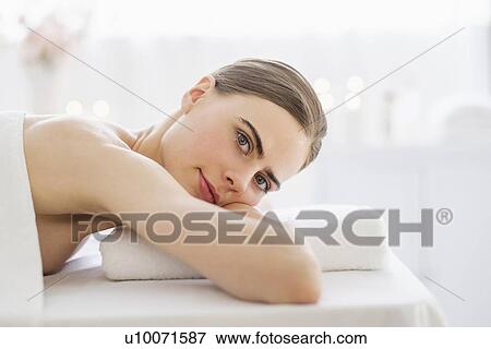 Young woman relaxing in spa View Large Photo Image Stock Photo - Young woman relaxing in spa. Fotosearch