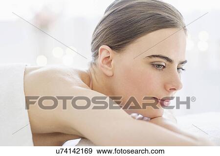Young woman relaxing in spa View Large Photo Image Stock Photo - Young woman relaxing in spa. Fotosearch