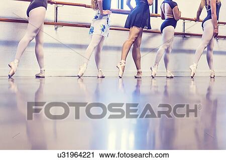Young women dancing in dance studio View Large Photo Image Stock Image - Young women dancing in dance studio. Fotosearch