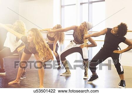 Young women dancing in dance studio View Large Photo Image Stock Image - Young women dancing in dance studio. Fotosearch