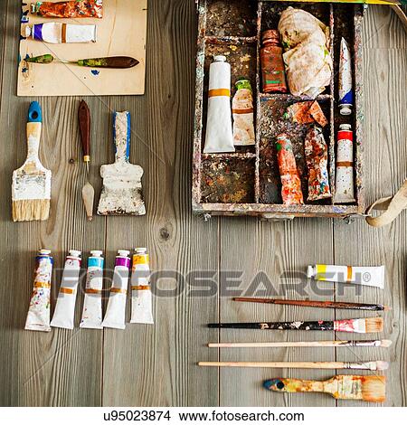 Artist's equipment arranged on table, overhead view View Large Photo Image Picture - Artist's equipment arranged on table, overhead view. Fotosearch