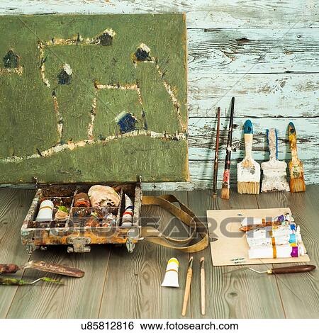 Stock Photograph - Artist's equipment arranged on table. Fotosearch