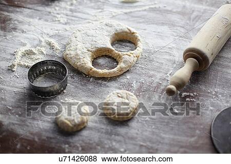 Baking preparation with scone dough and pastry cutters View Large Photo Image Stock Photo - Baking preparation with scone dough and pastry cutters. Fotosearch