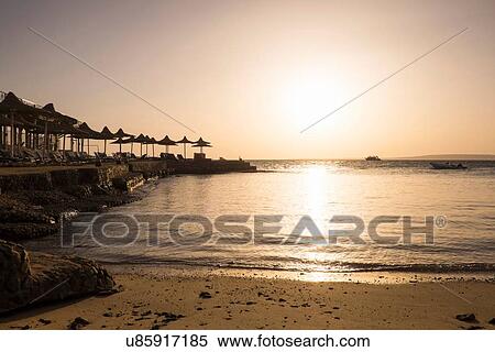 Stock Photography - Beach at sunset, Hurgada, Red Sea, Egypt. Fotosearch