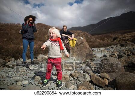 Picture - Boy pointing and shouting. Fotosearch