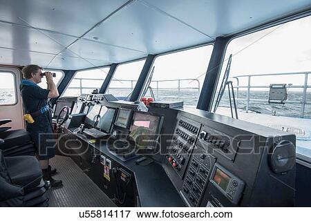 Captain at the bridge of marine research ship View Large Photo Image Stock Photo - Captain at the bridge of marine research ship. Fotosearch
