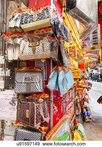 Stock Photo - Cardboard handbags for religious offerings at buddhist funerals. Fotosearch