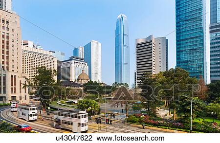Stock Image - Central Hong Kong business district: Chater garden and skyline with IFC building, Hong Kong, China. Fotosearch
