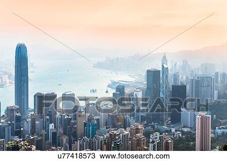 Stock Image - Central Hong Kong skyline and Victoria harbor, Hong Kong, China. Fotosearch
